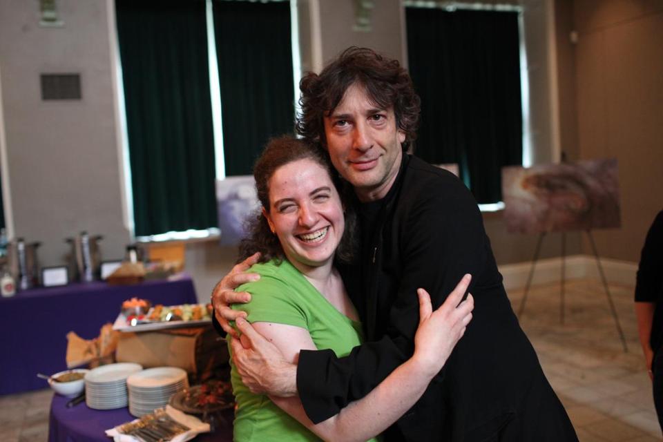 Charlie Mahoney for The Boston Globe. "Gillian Daniels poses with author Neil Gaiman prior to his reading at the Multicultural Arts Center."