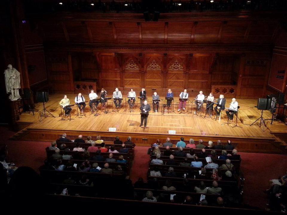 Photo courtesy of Artsboston; a picture of the cast at the reading with Mr. Scanlan in the front. 